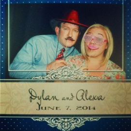 ...in a Photo Booth at a summer wedding!